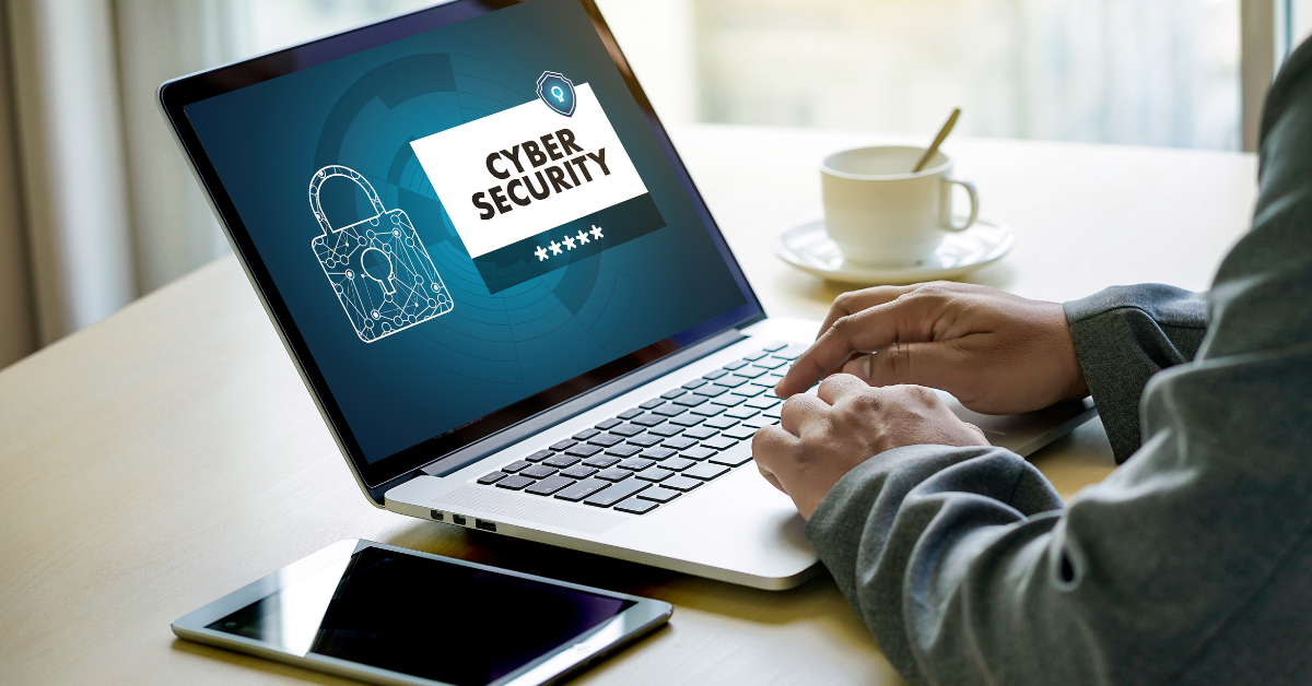 Closeup of person viewing a cybersecurity screen on a laptop